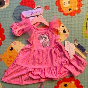 Never worn and my girl has outgrown them! 12month dress with matching headband